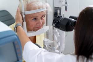older women having her eyes tested